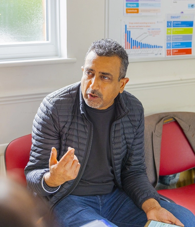 Workshop attendees having a conversation.