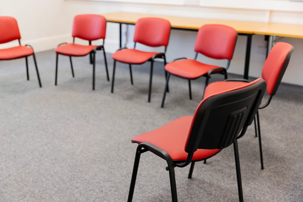Empty chairs ready for a group workshop session.