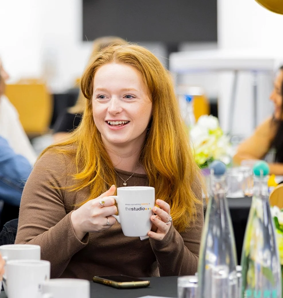 Volunteers at Aquarius enjoying refreshments together.