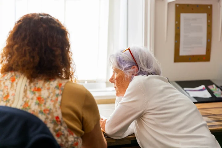 A person sharing with another person for support.